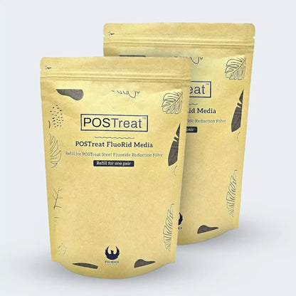 Two POSTreat Fluoride Reduction Filter packages on a white background