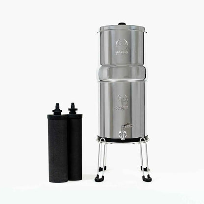 Phoenix Gravity  Stainless steel water filter with two black filters on a white background